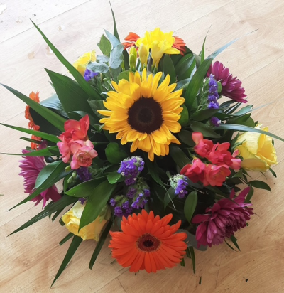 Vibrant Posy Tribute - A beautiful mix of vibrant, bright, beautiful flowers. A lovely tribute to someone special.