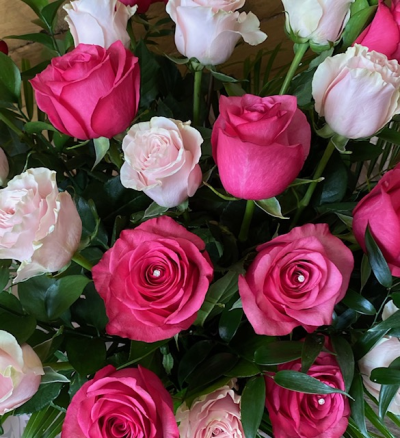 Red and Pink Rose Bouquet - This will be a beautiful bouquet created by one of our talented florists and include a mix of fresh red and pink roses with a variety of foliage and presented in one of our boxes with food and water for longer lasting stems. Our aim is to make the bouquet as close as possible to the picture but this depends on availability.

Standard is 12 roses

Deluxe is 18 roses

Luxury is 24 roses