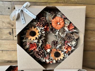 Artificial Autumnal Wreath - Why not gift someone this beautiful artificial autumnal wreath that can be enjoyed for years to come. Its 31cm and has a lovely selection of foliage, fir cones and sunflowers and pumpkins.